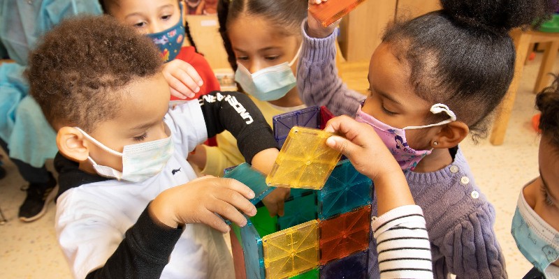 Children playing with a toy