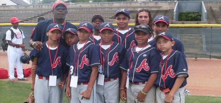 Picture of kids dressed in baseball uniforms