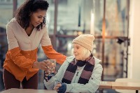 Woman helping woman