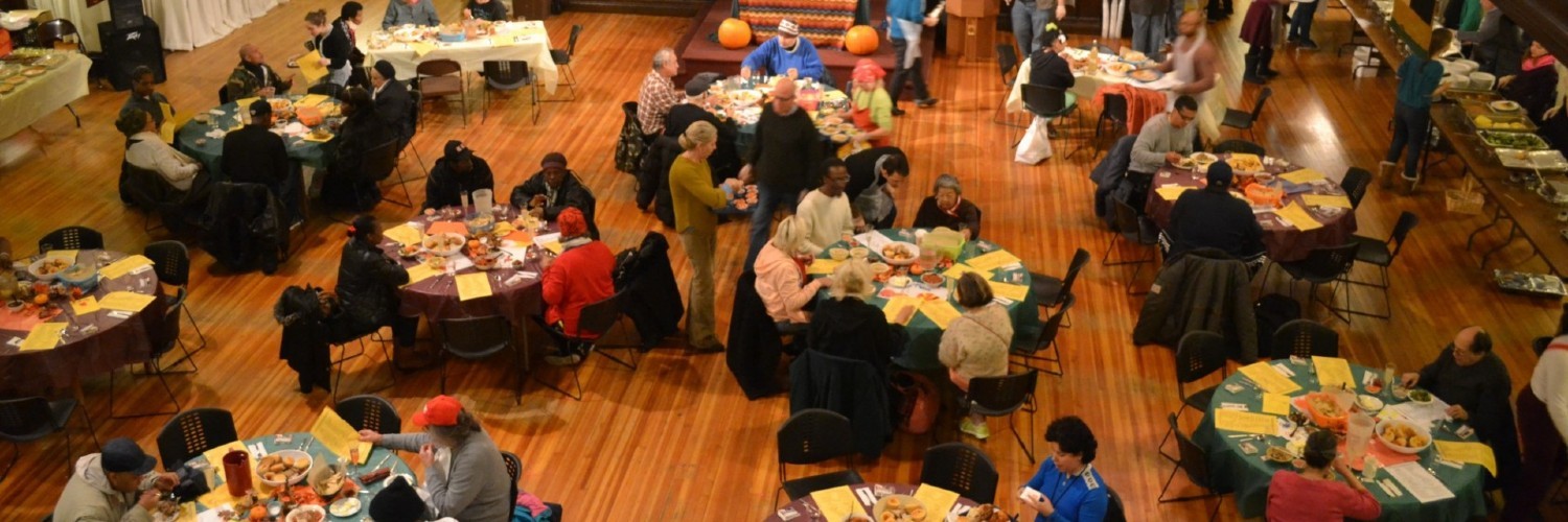 aerial shot of a banquet call with people eating 