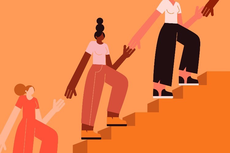 women helping women climb stairs