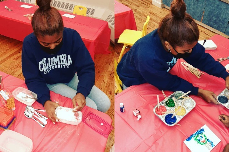 Two images of a young woman in a Columbia sweatshirt. In one she's preparing an activity and in another she's helping a student paint.