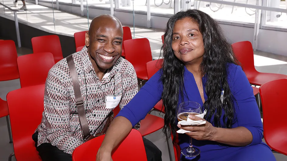 Two grantees pose for a photo. 