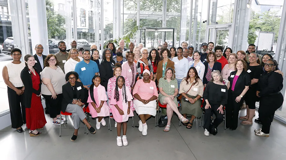 Columbia Community Service grantees and staff pose together for a photo at The Forum.