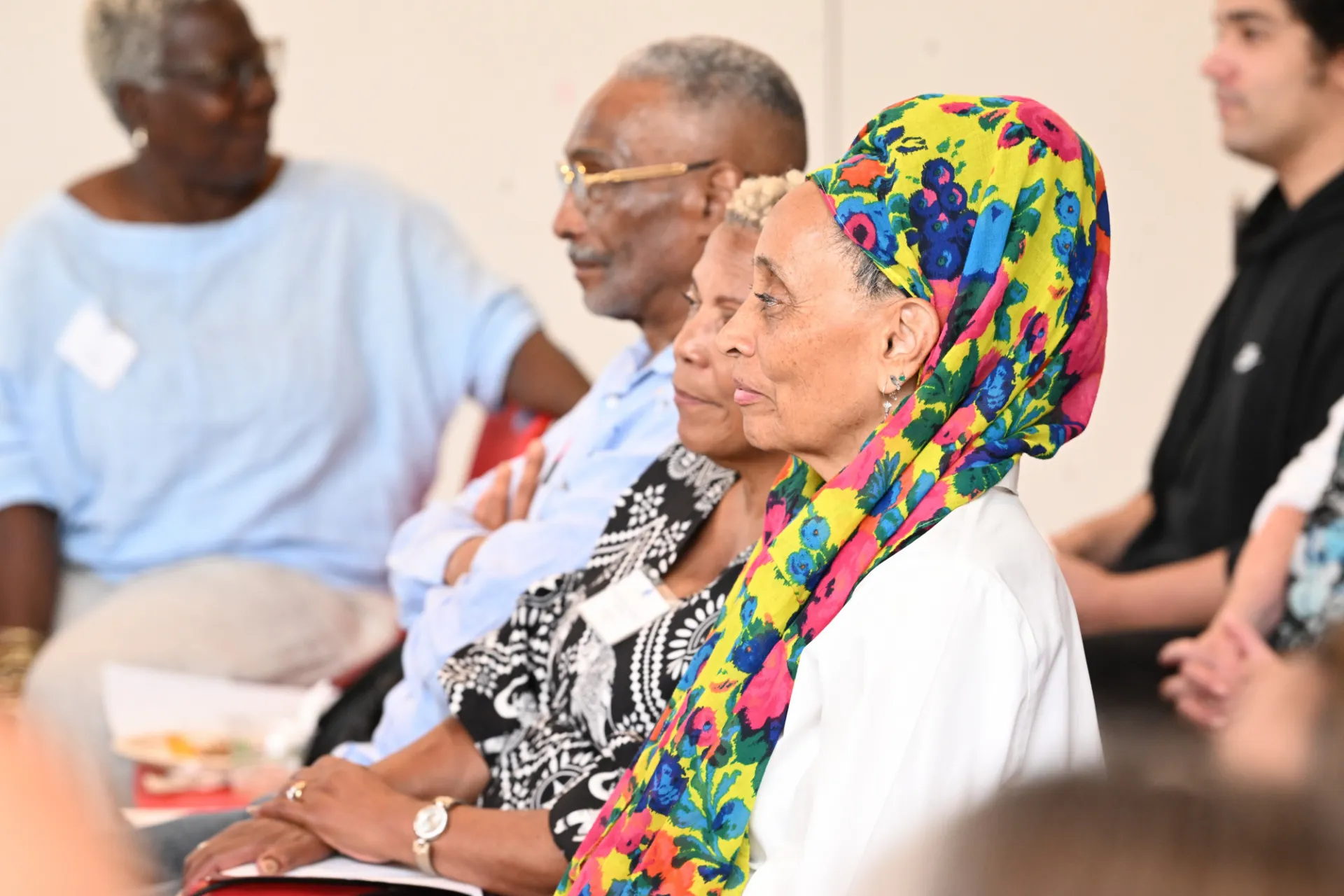 The audience is listening to a speech. 