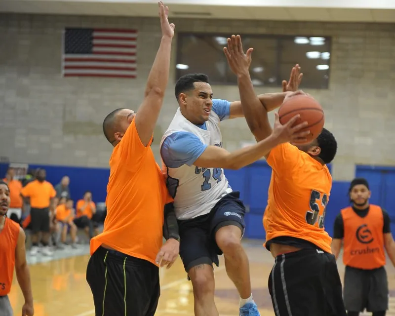 live action shot of three players.