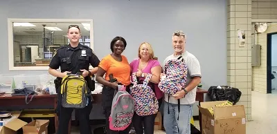 Picture of officer and parents