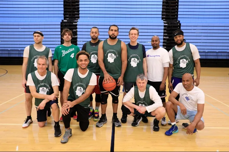 The Academiks team, pictured as a group of men standing and crouching.