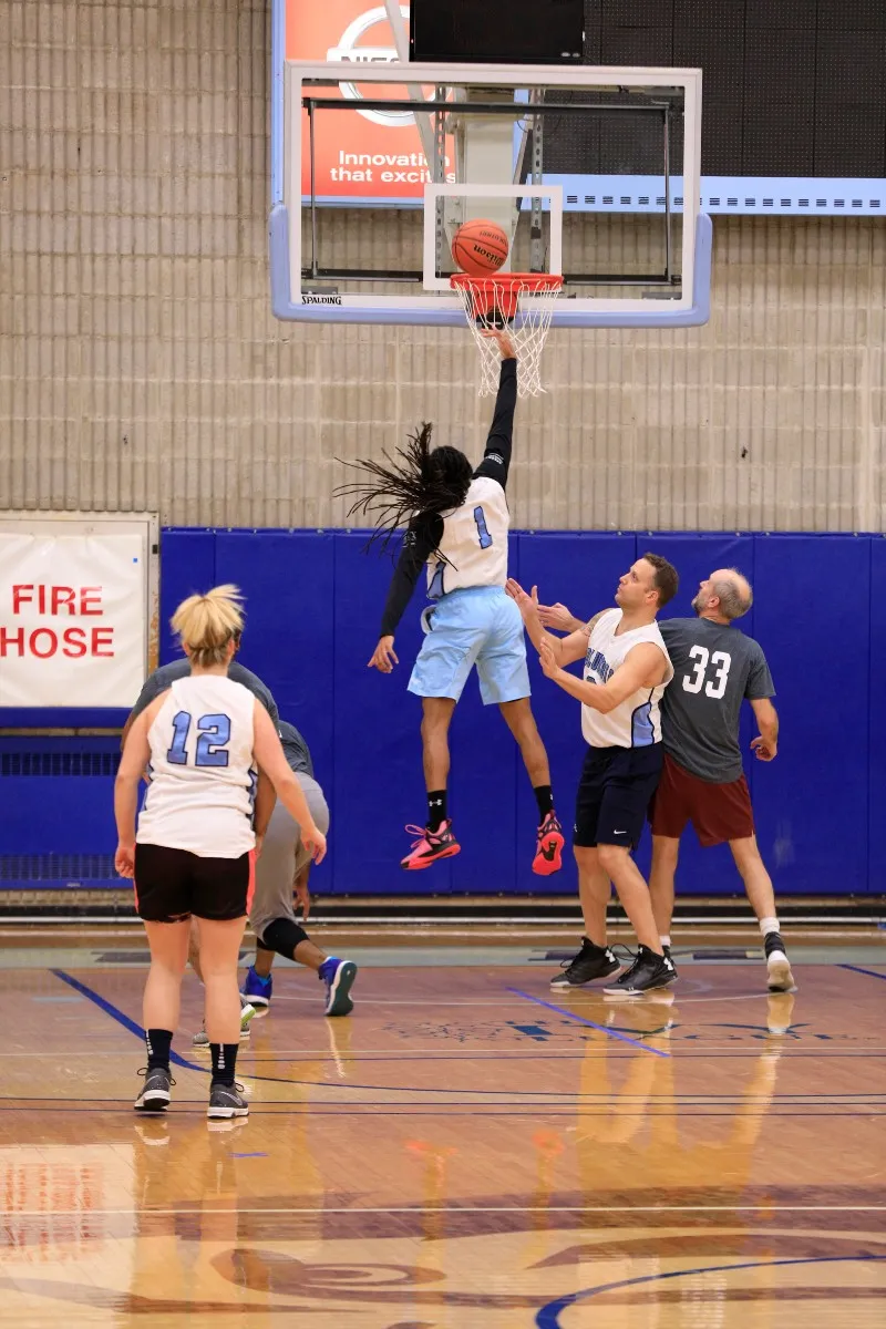A successful basketball dunk.